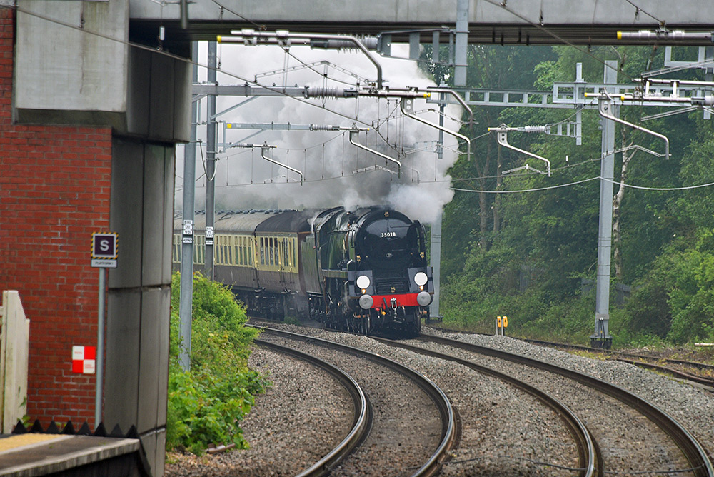 Picture of a steam train approaching in the distance