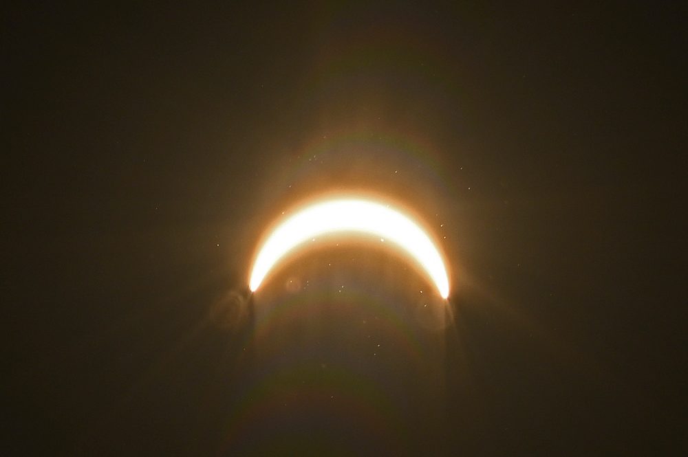 Picture of the sun mostly covered by the moon